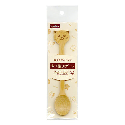 透明パッケージに入った状態。「耳つきでかわいい ネコ型スプーン Bamboo Spoon Natural Life」の文字と肉球・猫顔の背景柄入り台紙