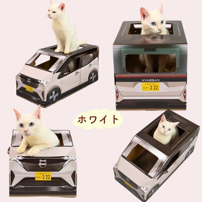 商品名「にゃさん サクラ」と「研ぐ」「遊ぶ」「くつろぐ」の機能訴求。赤・グレー・ピンクの車型ダンボールハウス3色が並び、赤いボディから白猫が顔と前脚を出している。人気の3色と表記