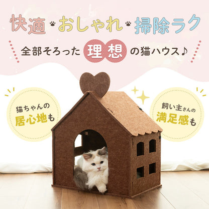 「快適・おしゃれ・掃除ラク 全部そろった理想の猫ハウス」の見出し。ハート屋根の家型ハウスに白猫が顔を出し、猫ちゃんの居心地も飼い主さんの満足感もと訴求