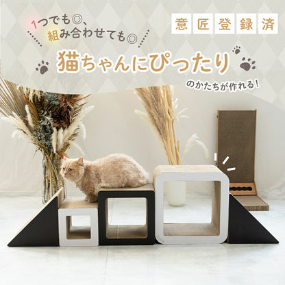 意匠登録済みの表記とともに、1つでも組み合わせても猫にぴったりの形が作れることを紹介。ベージュの猫が黒とベージュのキューブ・トライアングル型の上に座る写真