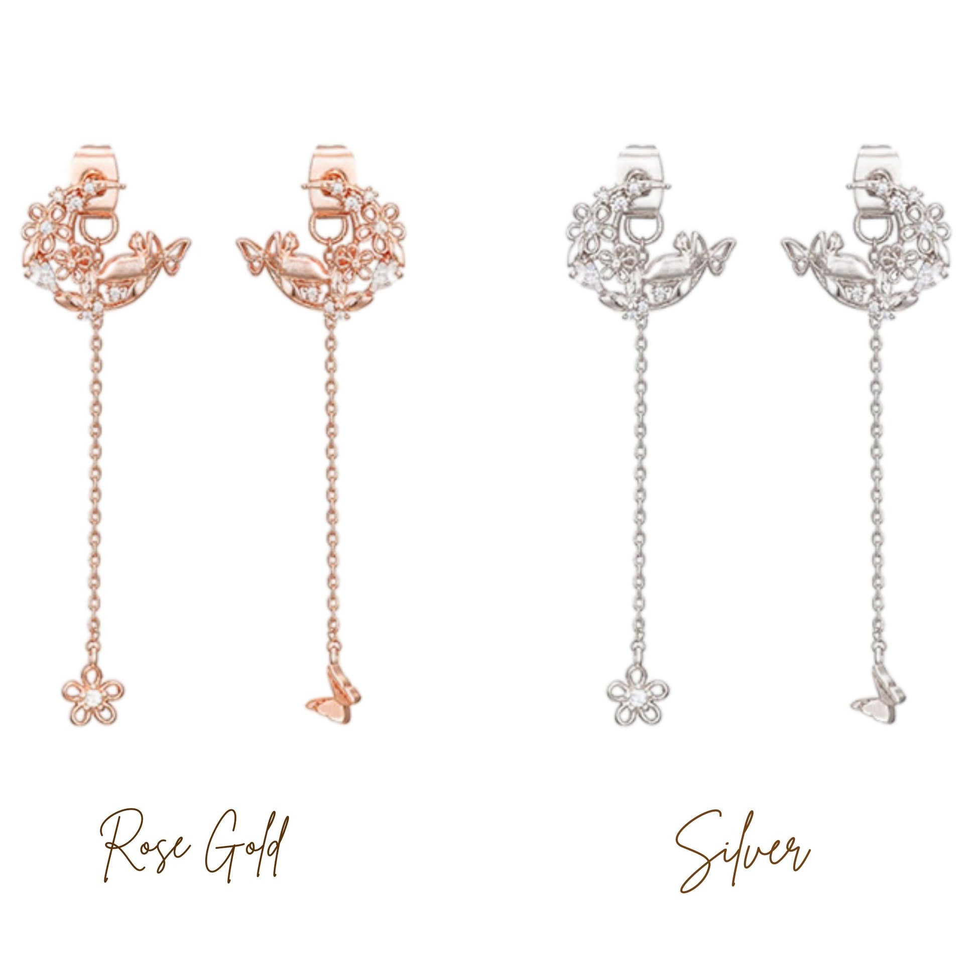 ブルーミングキャットピアスのRose Gold・Silver2色を並べた商品写真。花とちょうちょのモチーフから細いチェーンが伸び、先端に小花のチャームが付く左右非対称デザイン