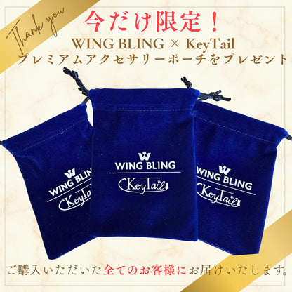 「今だけ限定！WING BLING×KeyTailプレミアムアクセサリーポーチをプレゼント」の文字と、ロゴ入り紺色巾着ポーチ3点の写真。購入者全員に進呈と記載
